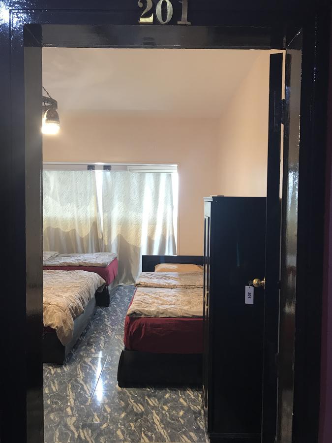 Quadruple Room with Shared Bathroom